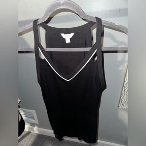 Lightly used
Black and white tank top
Dressy